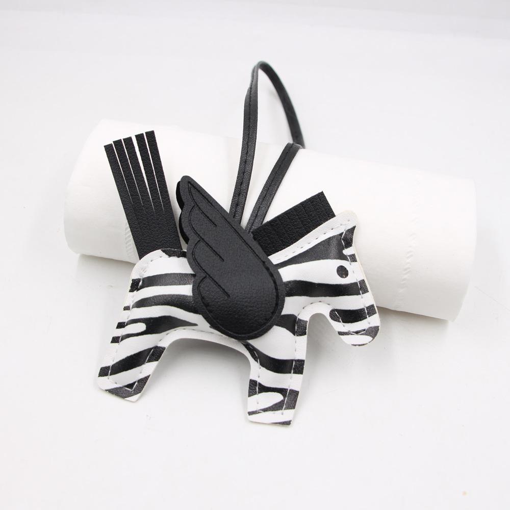 Hot Classic Wing Pony Bag Anhänger Dekorative Accessoires Auto Schlüsselanhänger Anhänger Hochwertige Lederproduktion Tassel winged horse weiß/schwarz