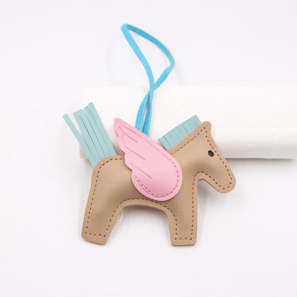 Hot Classic Wing Pony Bag Anhänger Dekorative Accessoires Auto Schlüsselanhänger Anhänger Hochwertige Lederproduktion Tassel winged horse rosa/blau