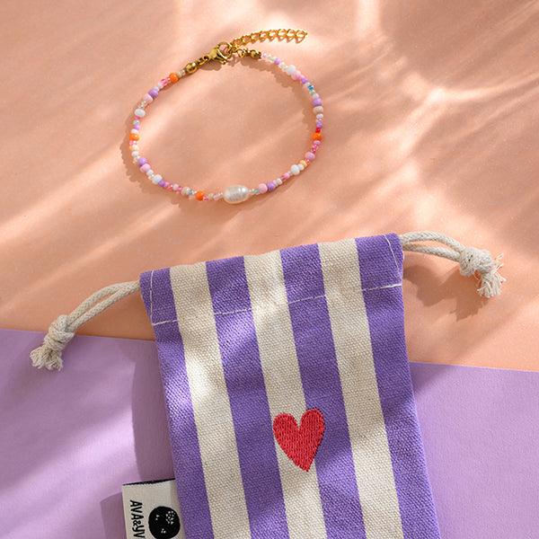 Perlenarmband flieder/ rosa