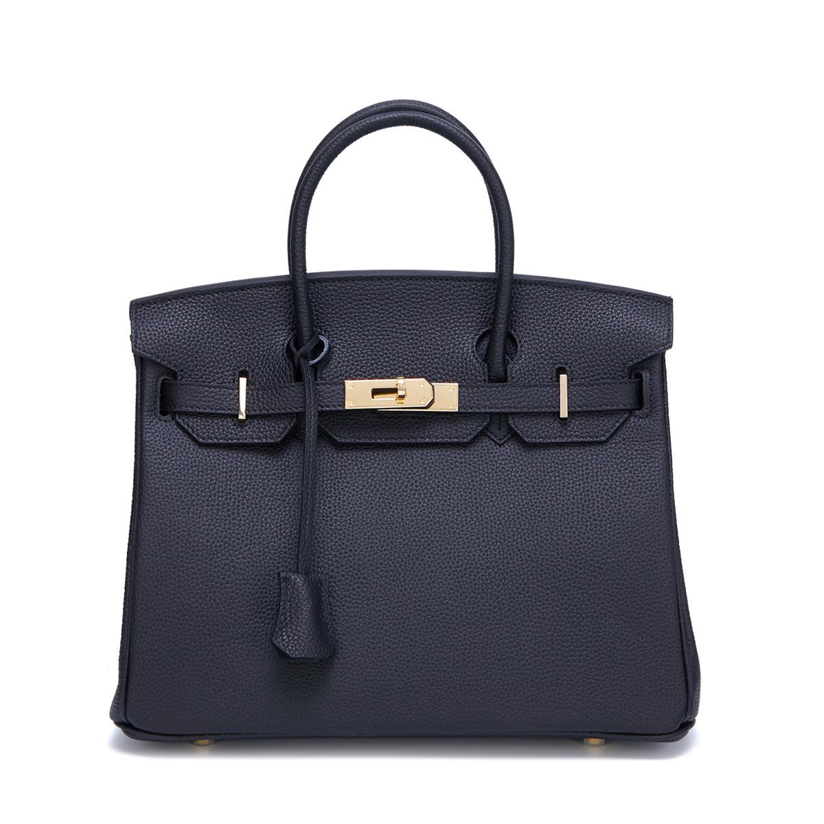 Neue Togo Small Grain Gold Buckle Platin Toe Cover Layer Rindsleder Damentasche Große Kapazität Handtasche Damentasche 35x15x25cm strapless schwarz