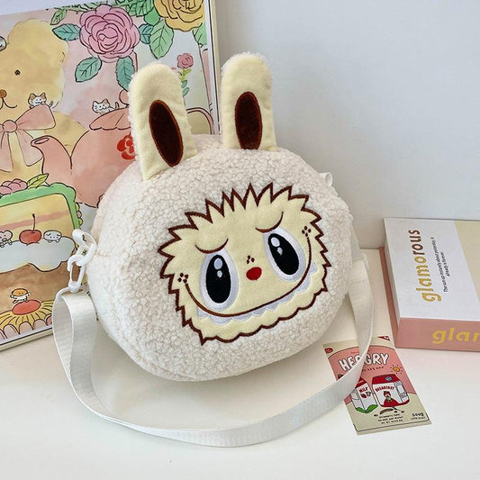 2025 Neue Beliebte Bubble Mart Schräge Umhängetasche Große Kapazität Weiche Haptik Kurzer Plüsch Kinder Schultertaschen Hässlich Niedlich Cartoon Kinder Aufbewahrung Crossbody Tasche elfenbein