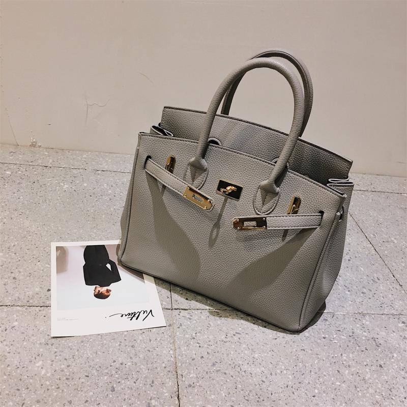 Frauen Taschen Mode Lychee Muster Platin Tasche Hand Schulter Diagonal Weibliche Tasche licht grau