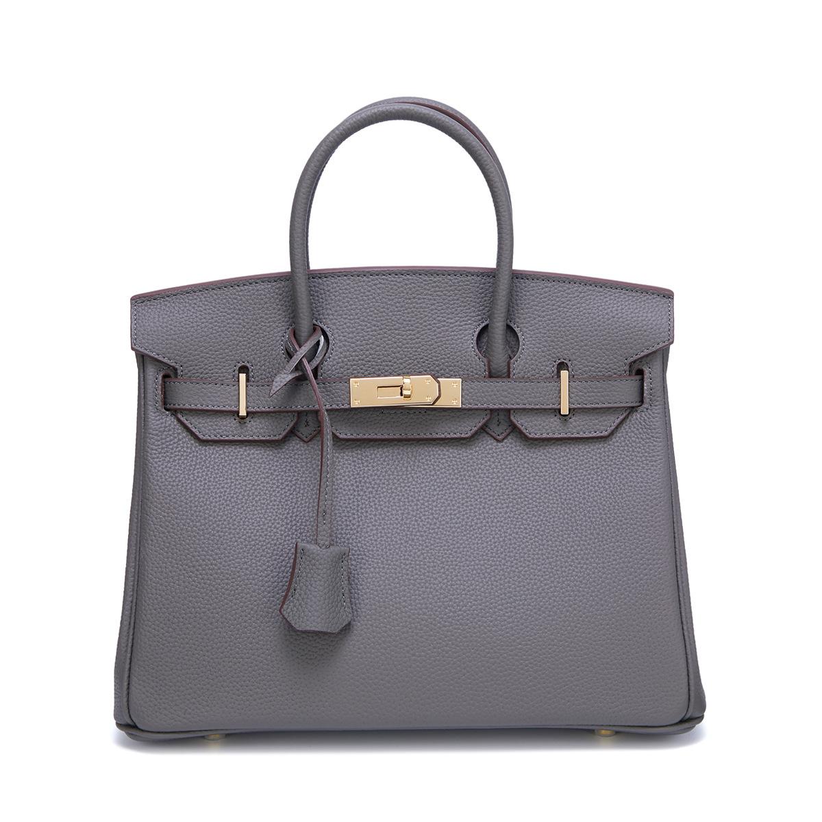 Neue Togo Small Grain Gold Buckle Platin Toe Cover Layer Rindsleder Damentasche Große Kapazität Handtasche Damentasche 30x12x23cm grau