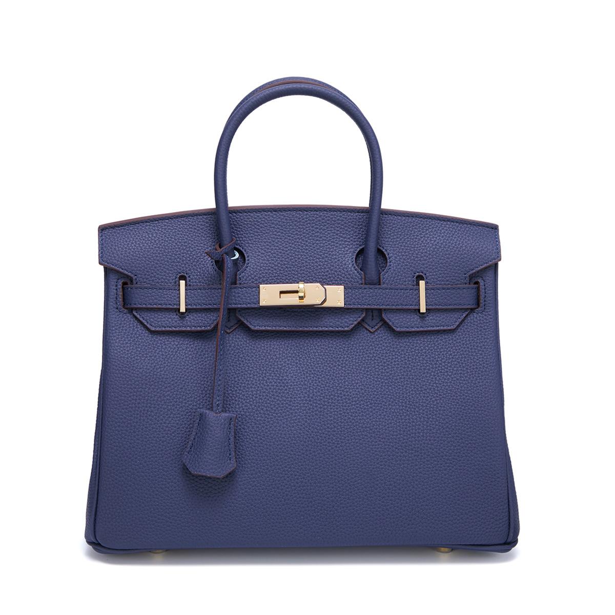Neue Togo Small Grain Gold Buckle Platin Toe Cover Layer Rindsleder Damentasche Große Kapazität Handtasche Damentasche 30x12x23cm navy blau