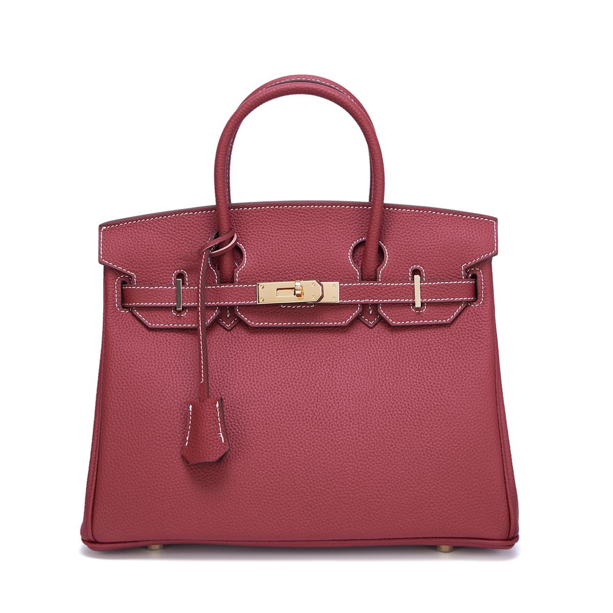 Neue Togo Small Grain Gold Buckle Platin Toe Cover Layer Rindsleder Damentasche Große Kapazität Handtasche Damentasche 30x12x23cm