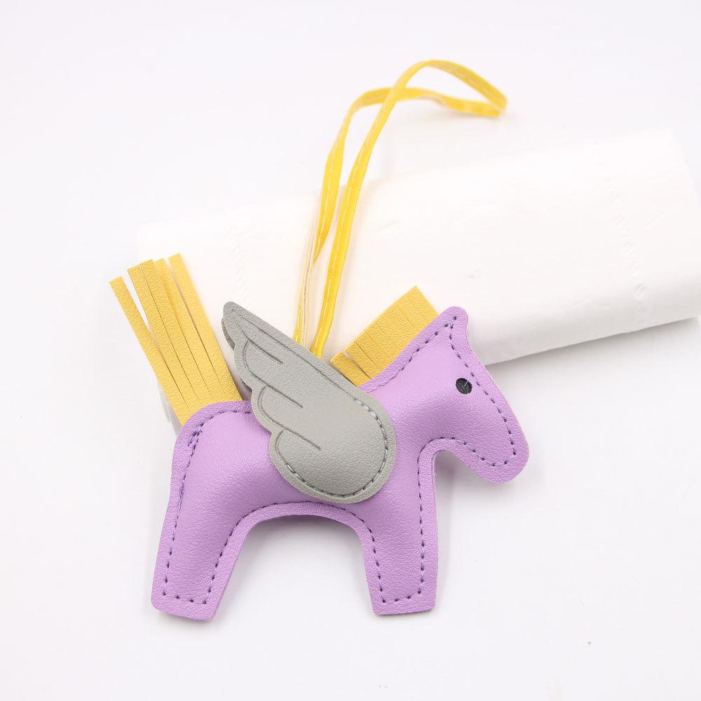 Hot Classic Wing Pony Bag Anhänger Dekorative Accessoires Auto Schlüsselanhänger Anhänger Hochwertige Lederproduktion Tassel winged horse violett