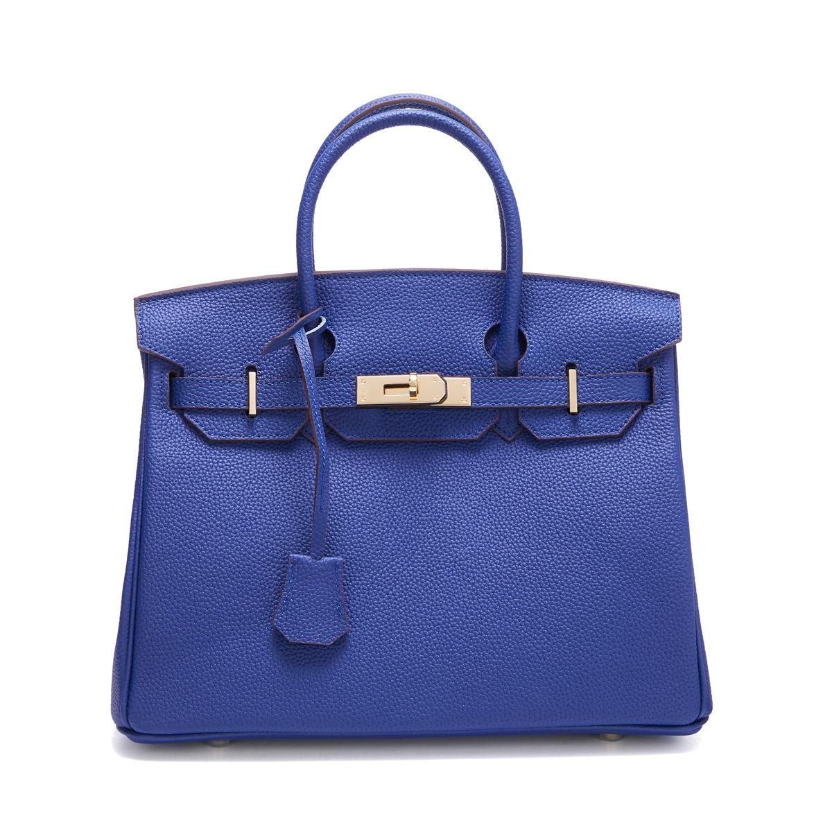 Neue Togo Small Grain Gold Buckle Platin Toe Cover Layer Rindsleder Damentasche Große Kapazität Handtasche Damentasche 30x12x23cm blau