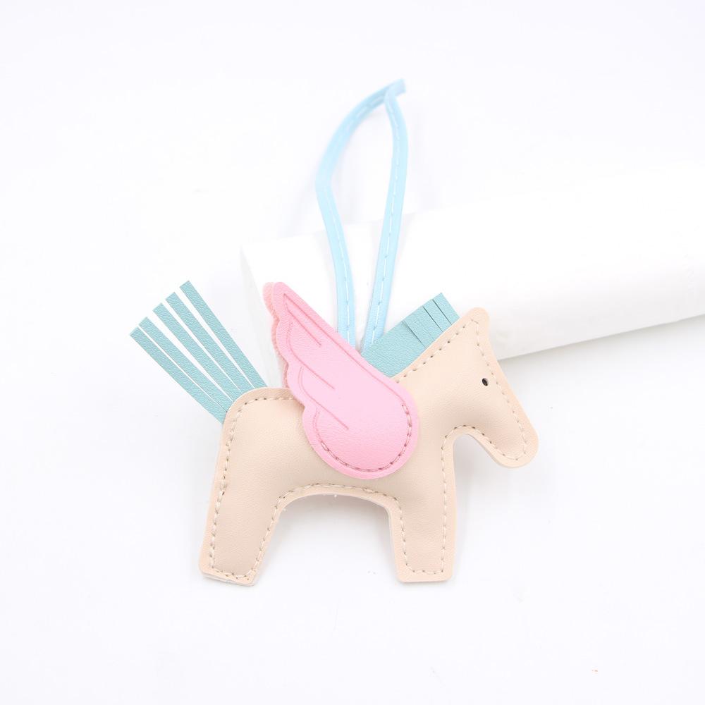 Hot Classic Wing Pony Bag Anhänger Dekorative Accessoires Auto Schlüsselanhänger Anhänger Hochwertige Lederproduktion Tassel winged horse blau/beige