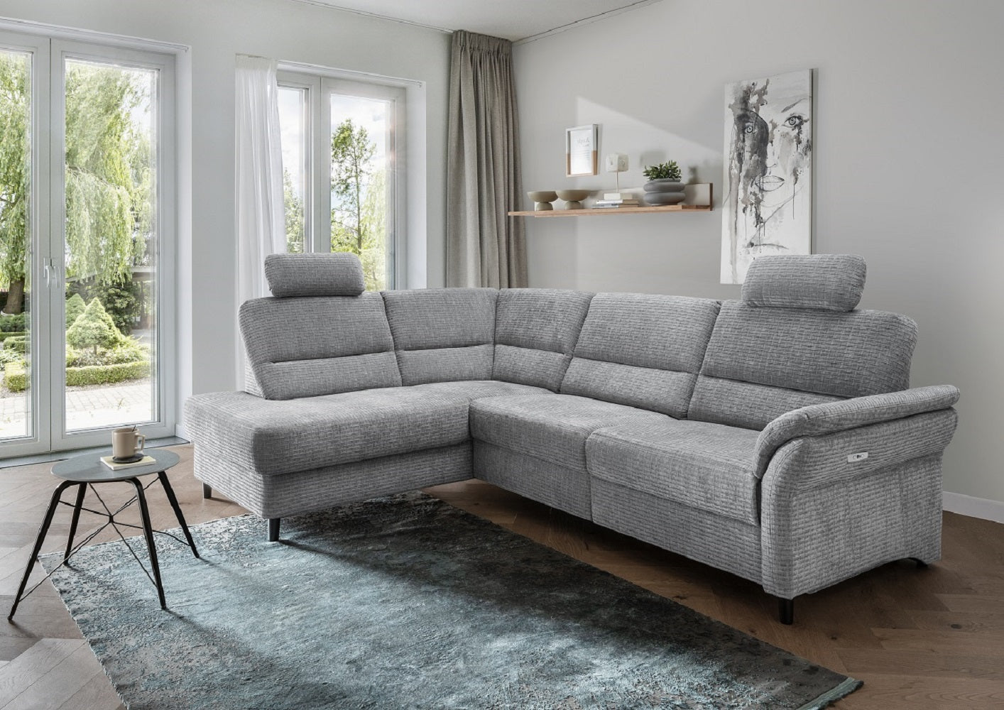 Das Ecksofa Cavoli mit elektronischer Relaxfunktion - Benformato